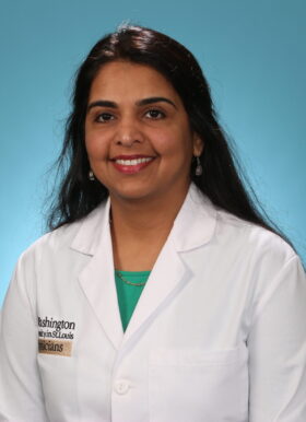 Dr. Anuja Java in white coat
