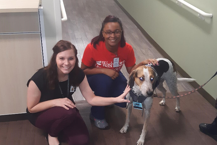 dialysis staff with emotional support dog