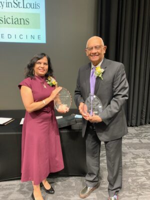 Drs. Aubrey Morrison and Anitha Vijayan with respective awards